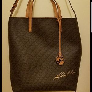 Michael Kors sling type bag